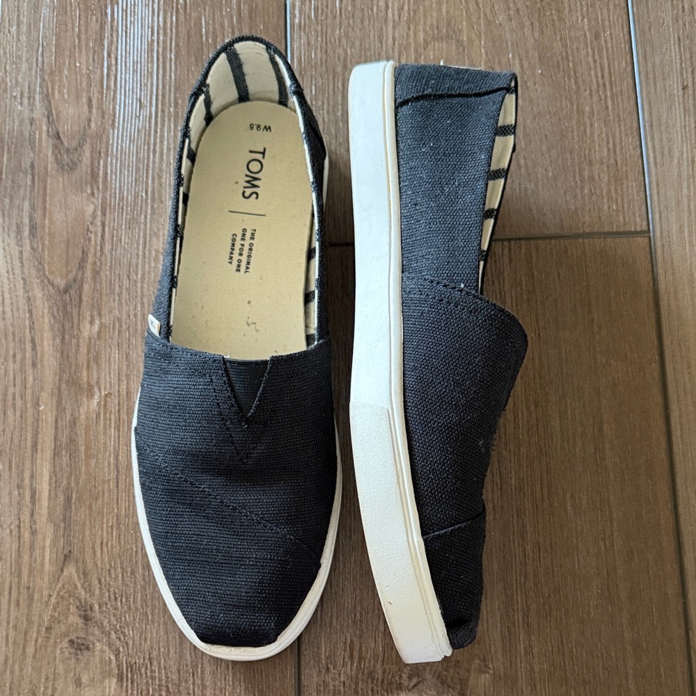 TOMS Black Canvas Slip-Ons
